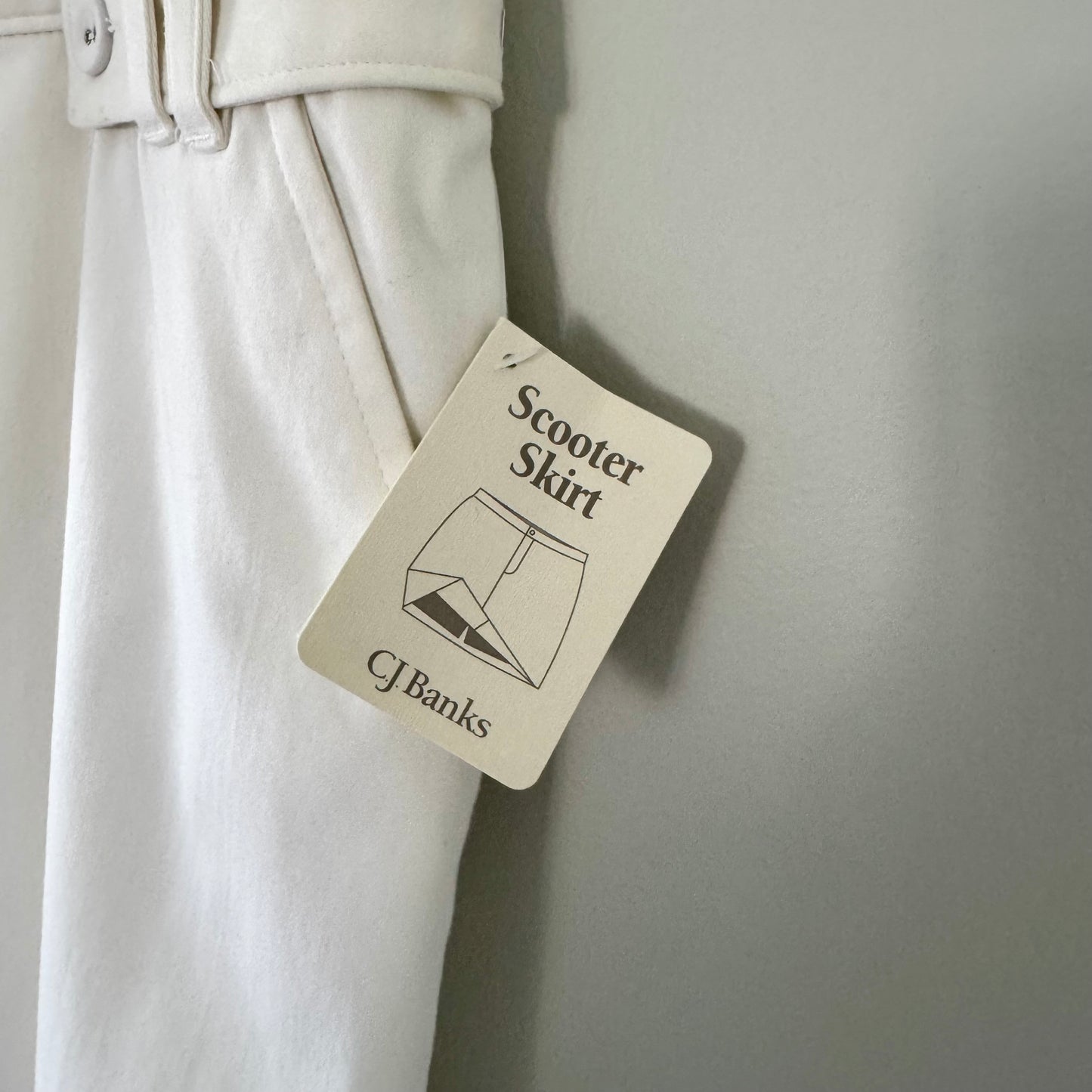 C.J. Banks White Stretch Scooter Skirt