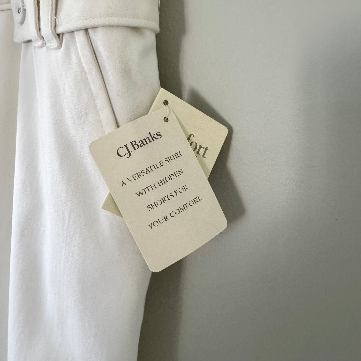 C.J. Banks White Stretch Scooter Skirt